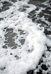 Fototapeta premium black and white photo of foamy water