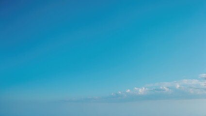 Obraz premium Cloudless blue sky acting as a natural textured background for decorative art pieces