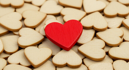 Obraz premium Red Wooden Heart Standing Out Among Beige Hearts Background for Love, Individuality and Valentine's Day Concepts, Ideal for Websites and Social Media