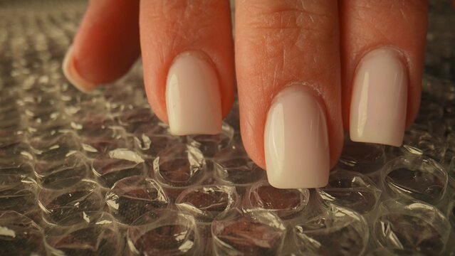 Hand Pressing Bubble Wrap for Relaxation and Stress Relief