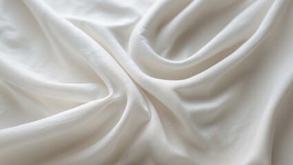 Obraz premium White textile fabric with clothing texture against a blurred background