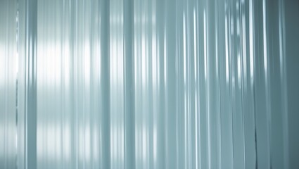 Obraz premium Modern White Glass Wall with Vertical Stripes and Reflective Surface in a City Building