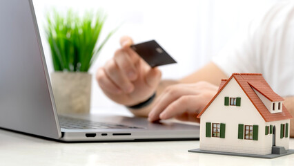 A man enters card details when buying online
