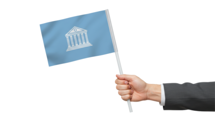 Isolated Hand Holding Flag with Bank Building