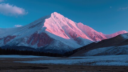 Vivid blue sky with pink mountains in the foreground