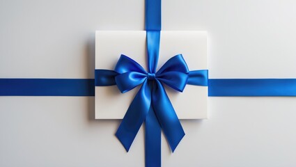 Zoomed-in image of a birthday card with a bow and seasonal decoration on a plain backdrop