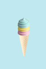 Colorful ice cream cone on a blue background. Summer concept.