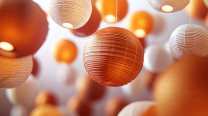 Fototapeta premium Orange and White Textured Pendant Lamps Hanging from Ceiling