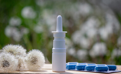 allergy pills spray dandelion drops. Selective focus