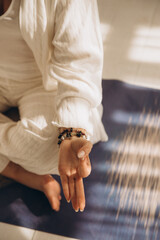 Woman hand in yoga symbolic gesture mudra