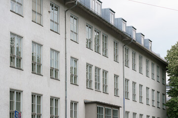 Architectural details of a modern building in an urban setting during overcast weather
