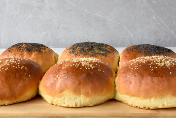 baked buns with poppy and sesame
