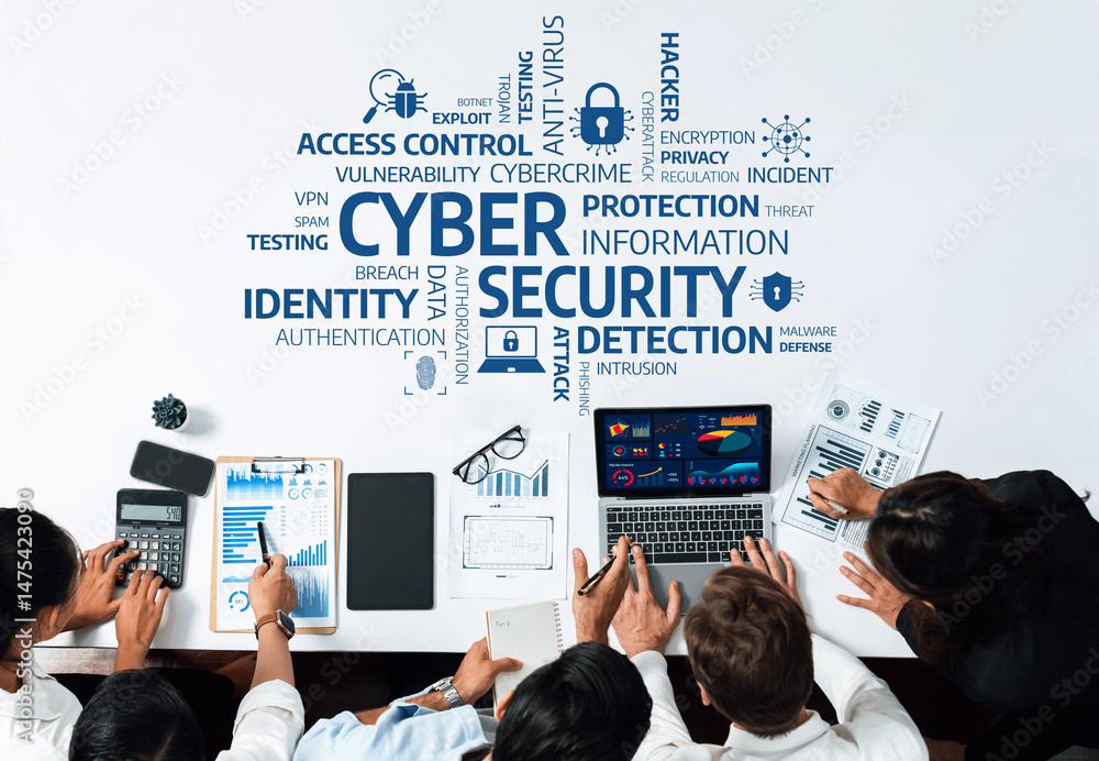 Poster A team collaborates at a table, focusing on cyber security. They analyze data and strategies to protect information from cyber threats, highlighting teamwork and technology use. Amity