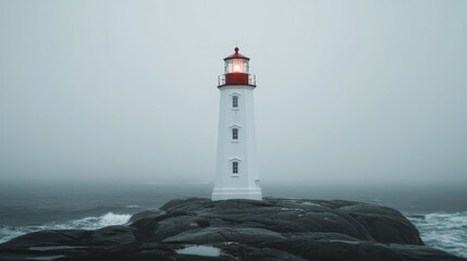 A Tall White Lighthouse Stands Guard On A Rocky Coastal Outcrop