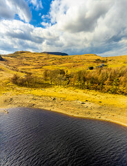 An aerial view from the lake towards the north shore of lake Tryweryn near Bala, Wales in springtime