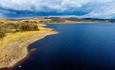 An aerial view along the north shore of lake Tryweryn near Bala, Wales in springtime