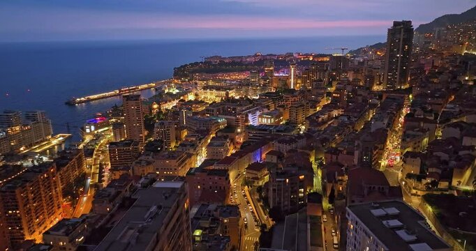 Aerial view of city centre of Monaco with night lights. France 