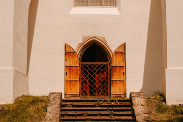 Behold a stunning vista showcasing a historic church entrance, complete with its beautifully...