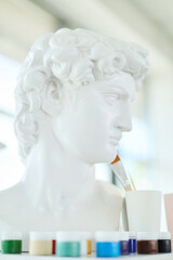 Classical David Bust with Paints and Brushes