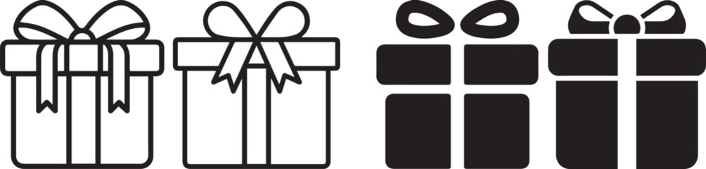 Obraz premium A collection of gift boxes adorned with elegant bows, showcasing a contrasting grayscale palette.