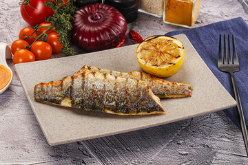 Grilled seabass fillet with lemon