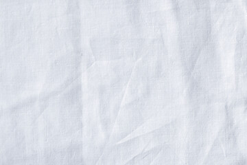 Close-up of white fabric texture with crumples and subtle details