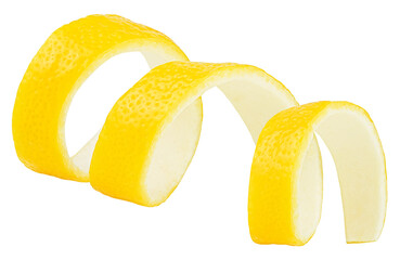 Lemon twisted peel isolated on a white background. Lemon fruit zest. Citrus zest.