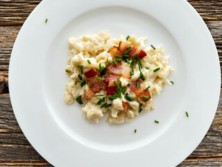 Traditional Slovak dish dumplings with sheep cheese / traditional sheep cheese calling  bryndza in Slovak language/