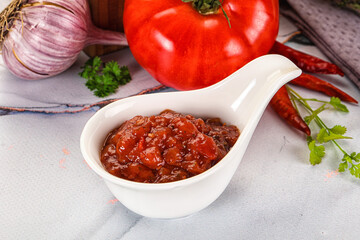 Salsa dip with chili and tomato