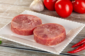 Raw round tuna fish fillet