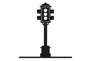 Isolated traffic light silhouette stands firmly, offering simple traffic direction within the city