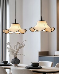 Elegant, light beige pendant lamps over a dining table.