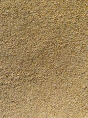 Yellow corn flour. Grainy background. Cereals.