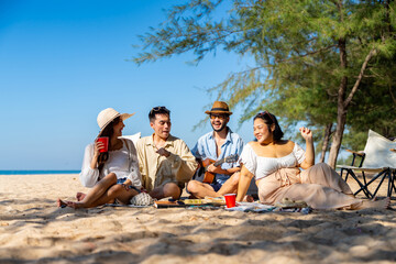 Happy Asian man and woman travel the sea on summer beach holiday vacation. Group of People friends...