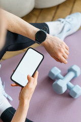 Fitness tracker app displaying sport training data during indoor workout session