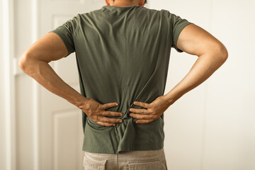 Man suffering from lower back pain 