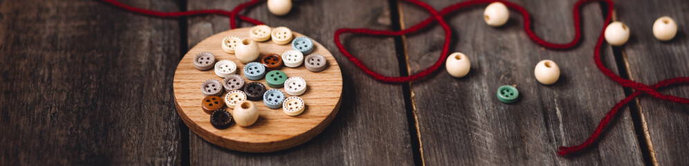 Banner. Family time, leisure activity, hobby, holiday recreation with children. Process of creation of handmade Christmas toys with cloth, buttons, honeycomb craft recycled paper. Zero waste, diy gift