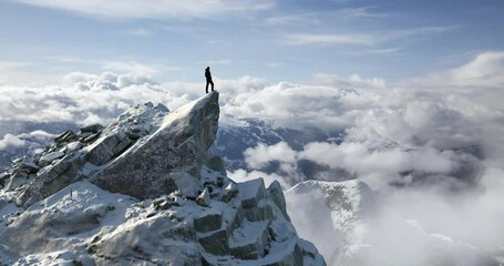 Hiker on Snowy Mountain Peak Above the Clouds in 3D