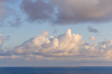 Coastal View of Puffy Clouds Above the Pacific Ocean Near Hawaii