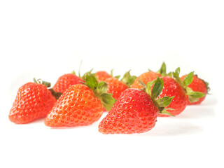 Tasty red strawberry on white background. Fine fruits. Tasty snack. Agriculture industry and food supply. Healthy meal choice.