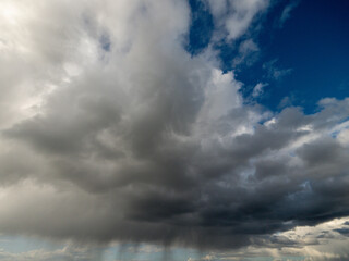 Obraz premium Blue cloudy sky, nature background for design. Clouds have random shape and form.