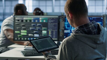 Computer scientist in data center uses artificial intelligence neural networks doing computing...