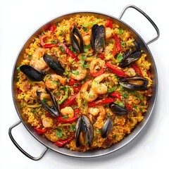 Delicious seafood paella in a stainless steel pan with mussels, shrimp, and red peppers top view white background