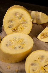 ripe white squash on the kitchen table during cooking and slicing