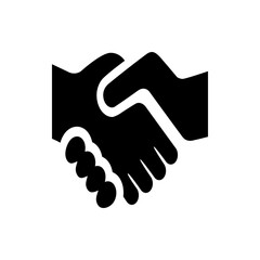 Illustration of a solid black handshake symbolizing agreement partnership and cooperation in a simple design