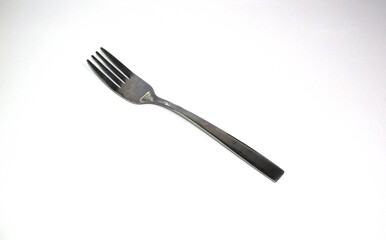 Stainless steel fork isolated on white background, simple cutlery design for kitchen, dining, and...