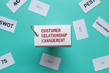 There is word card with the word Customer Relationship Management. It is as an eye-catching image.