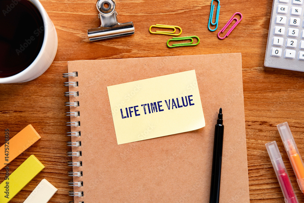 Poster there is sticky note with the word life time value. it is as an eye-catching image.