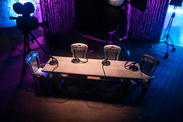 Podcast Studio Setup with Four Microphones and Cameras Ready for Recording