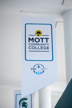 Sign board of MOTT community college at Flint Bishop International airport, is a public community college in Flint, Michigan